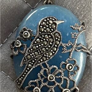 Blue Pendant Necklace with Bird Design